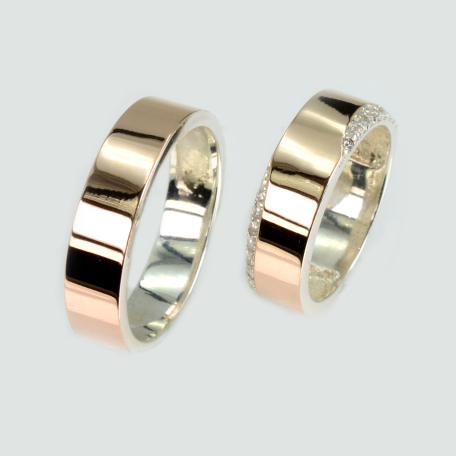 Пара обручальных колец из серебра и золота
