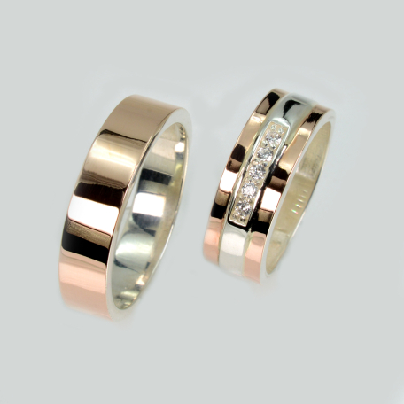 Пара обручальных колец из серебра и золота