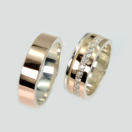 Пара срібних обручок з золотом