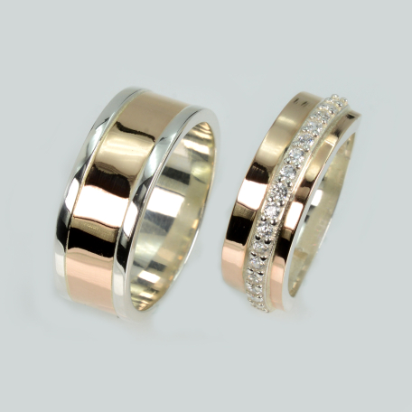 Пара обручальных колец из серебра с золотом