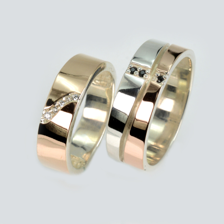 Пара обручок зі срібла та золота