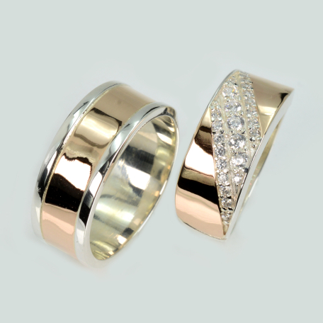 Пара срібних обручок з золотом