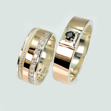 Пара обручальных колец из серебра и золота