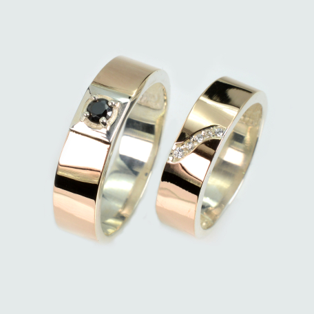 Пара срібних обручок з золотом