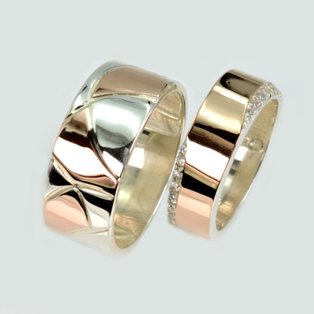 Пара обручок зі срібла та золота