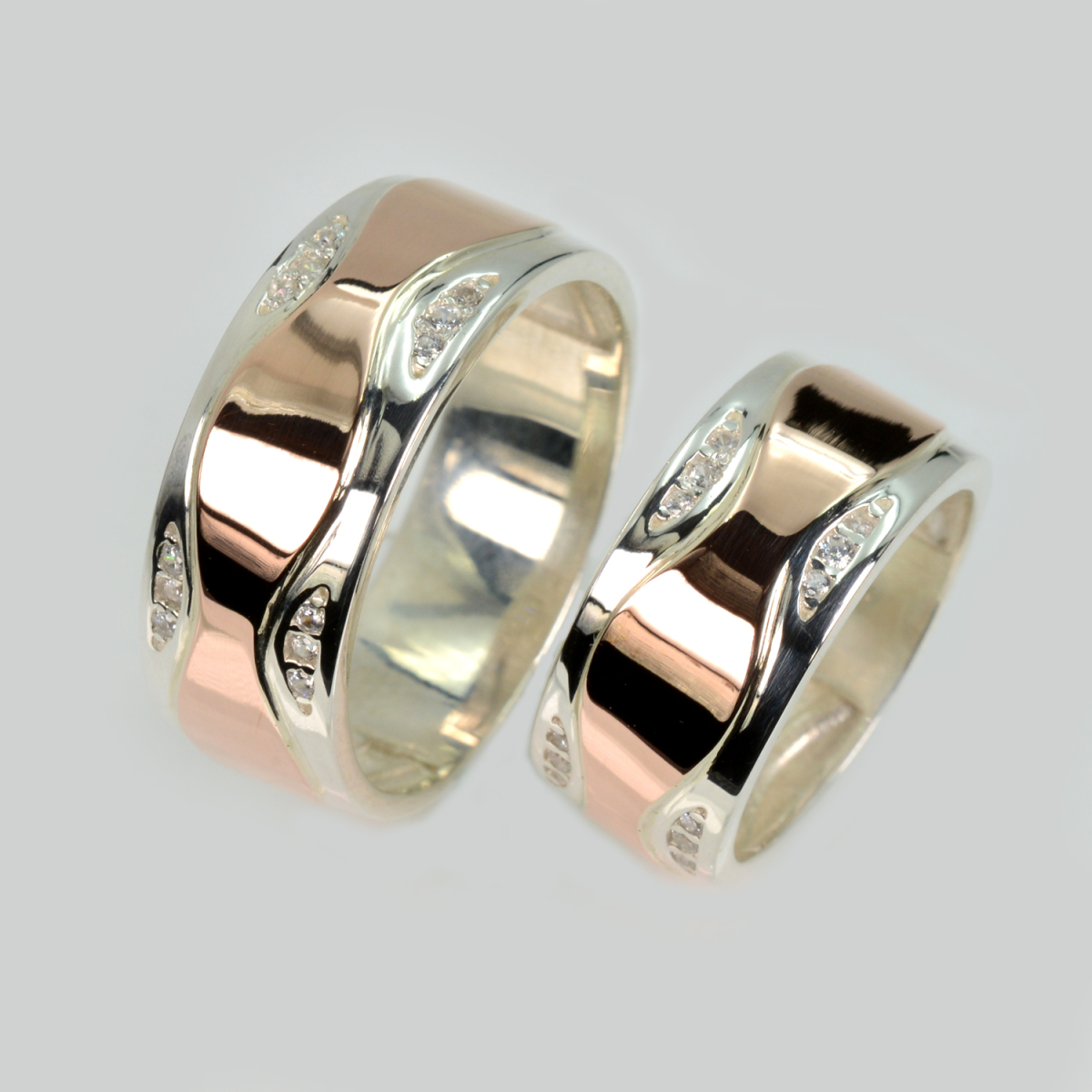 Пара срібних обручок з пластинами золота