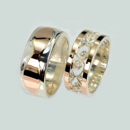 Пара обручальных колец из серебра и золота