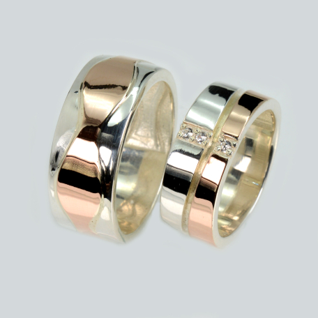 Пара обручальных колец из серебра и золота