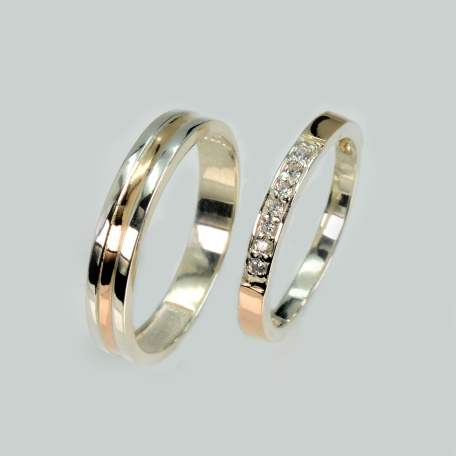 Пара обручок зі срібла та золота