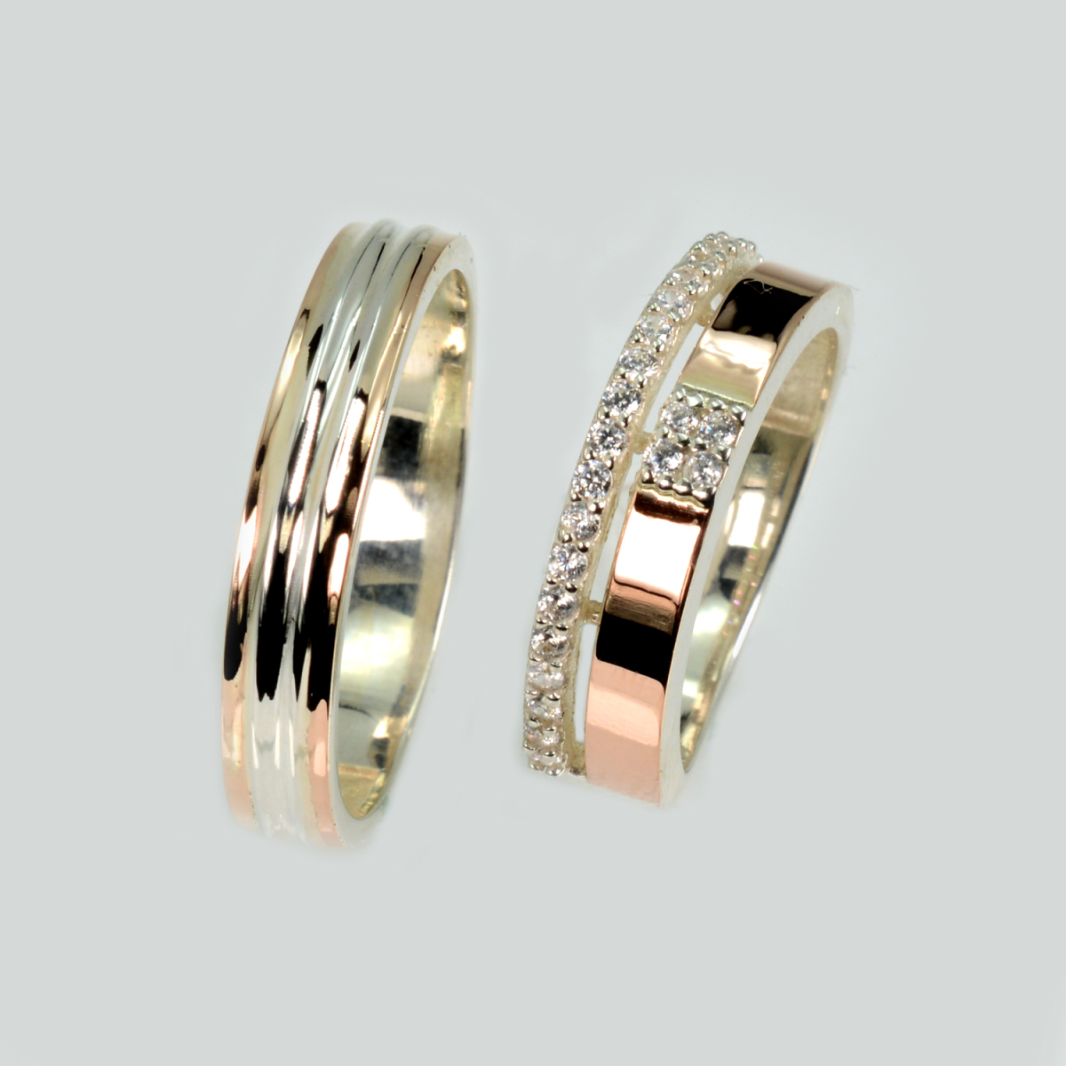 Пара срібних обручок з золотом