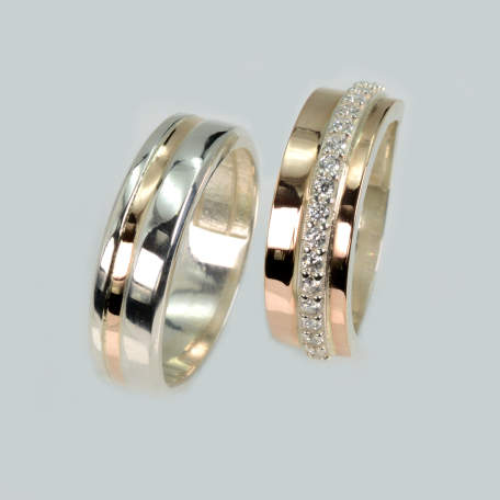 Пара обручальных колец из серебра и золота