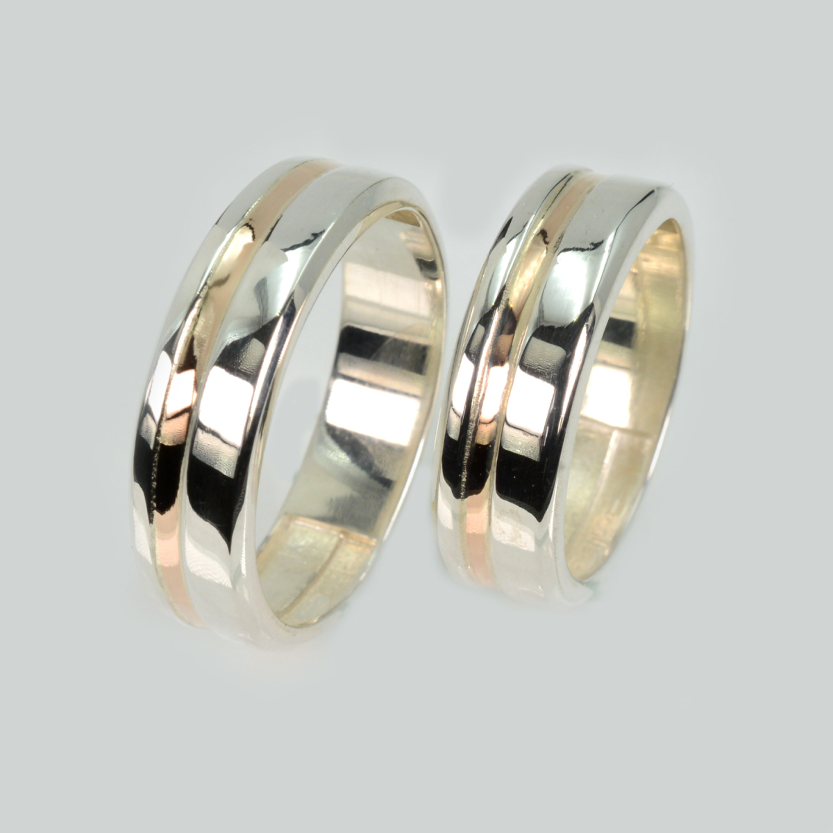 Пара срібних обручок з пластинами золота