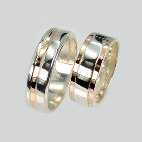 Пара обручок зі срібла та золота