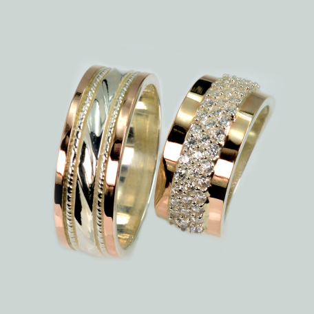 Пара обручальных колец из серебра и золота