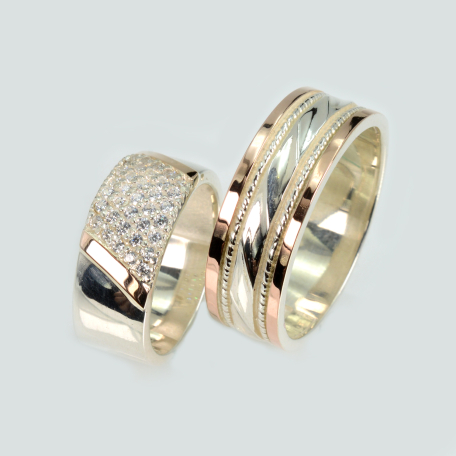 Пара обручальных колец из серебра и золота