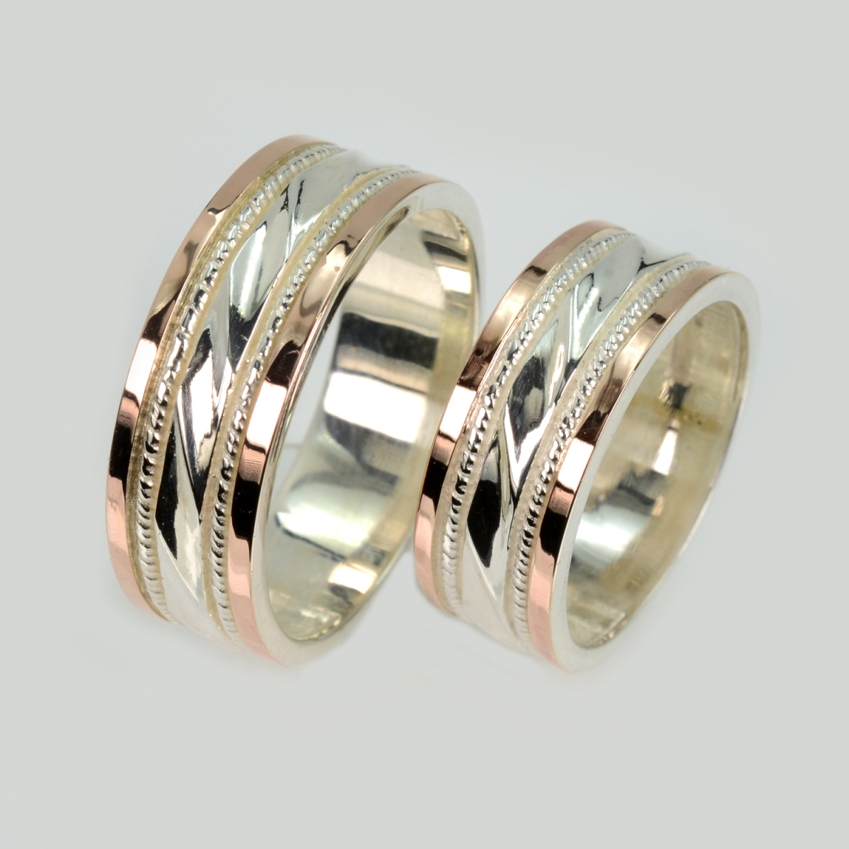 Пара срібних обручок з пластинами золота