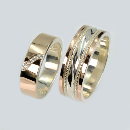 Пара обручок зі срібла та золота