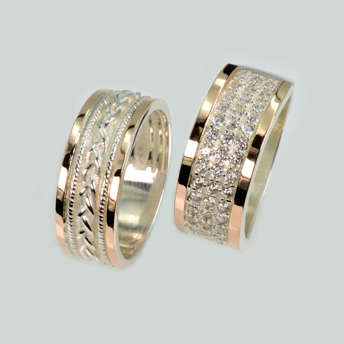 Пара срібних обручок з золотом