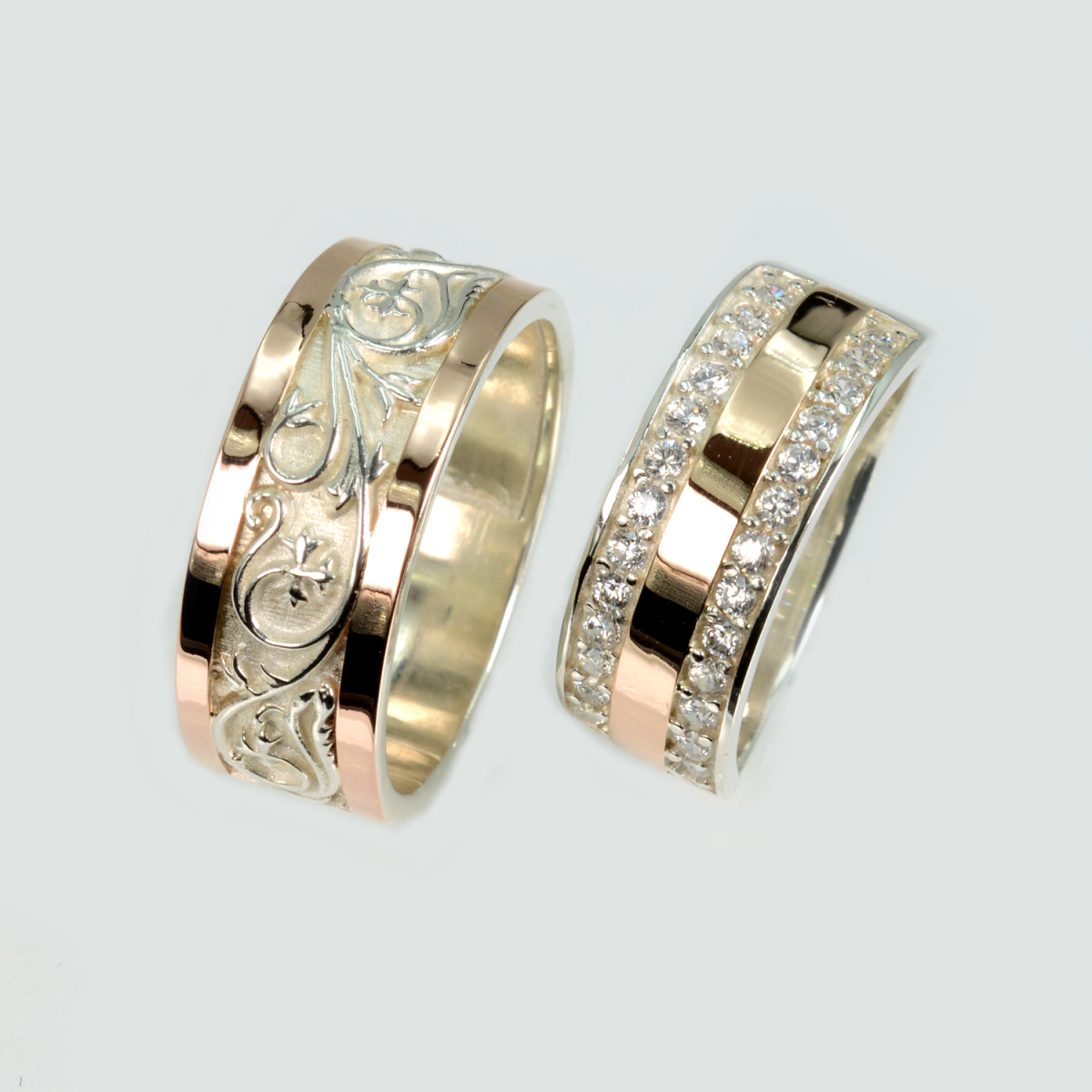 Пара срібних обручок з золотом