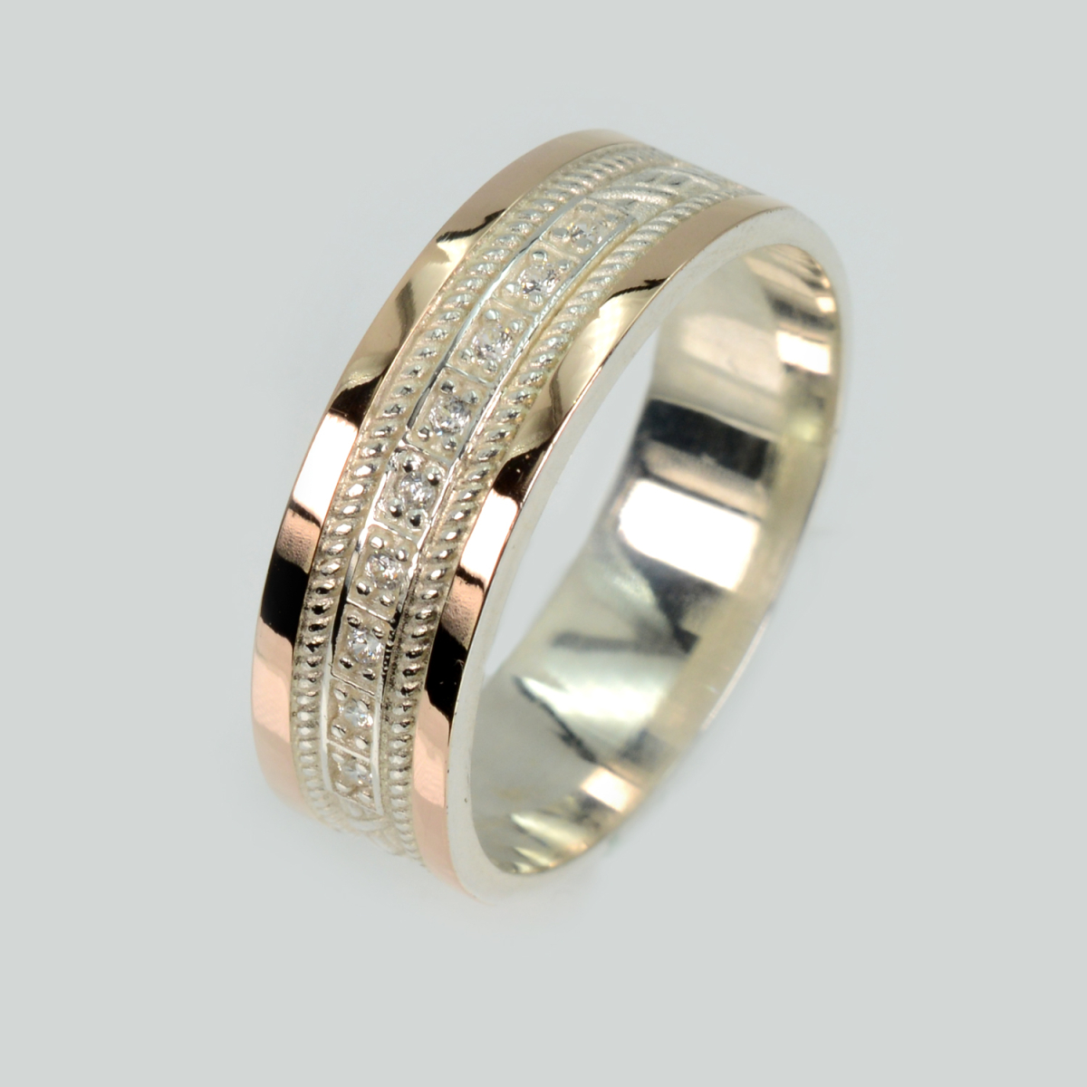 Обручка срібна з золотими пластинами