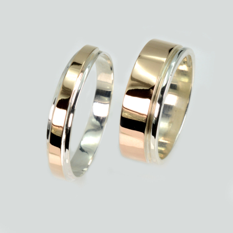 Пара срібних обручок з золотом
