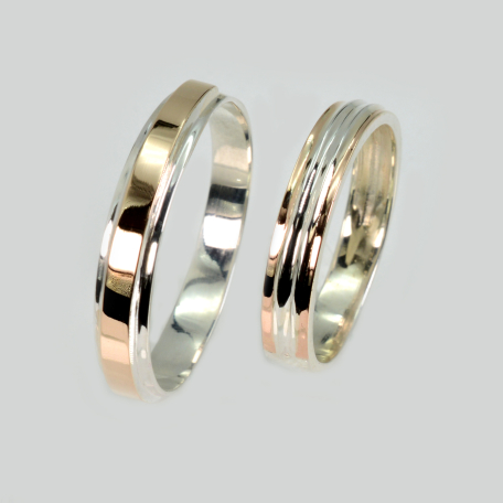 Пара обручальных колец из серебра и золота