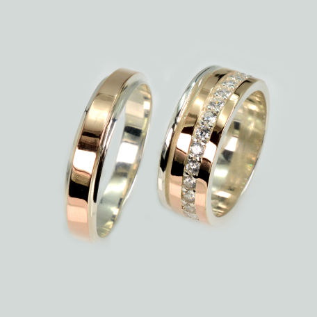 Пара обручальных колец из серебра с золотом