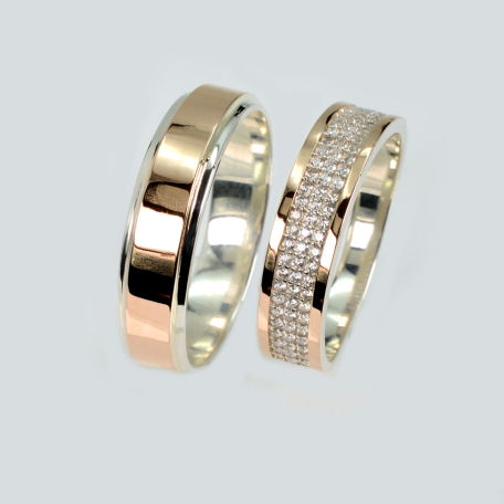 Пара серебряных обручальных колец с золотыми пластинами