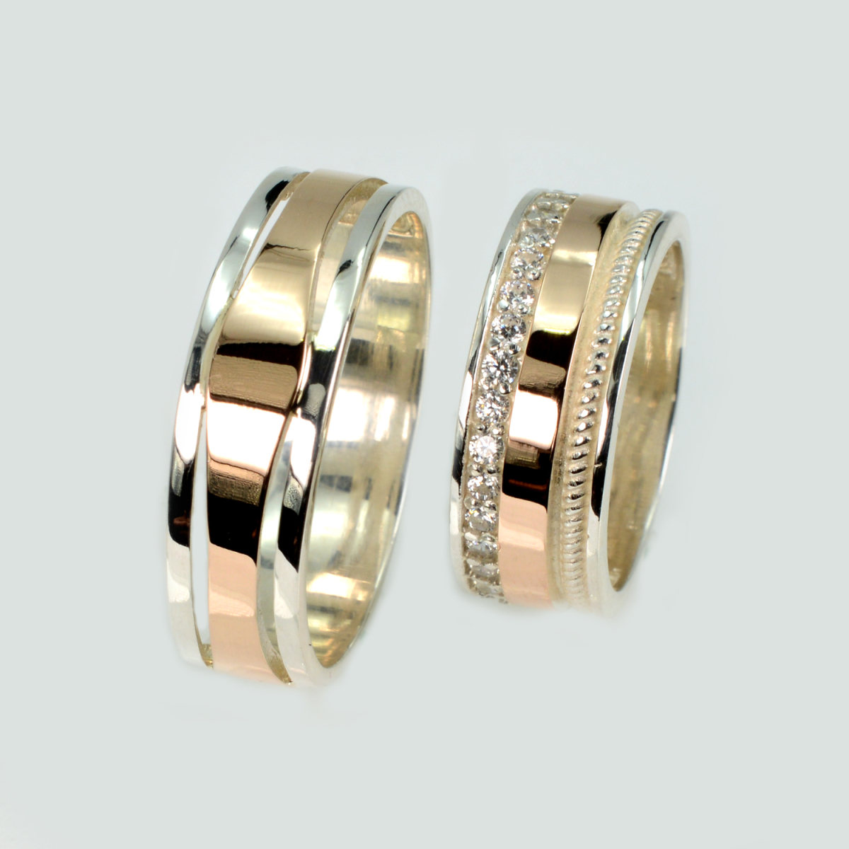 Пара срібних обручок з пластинами золота