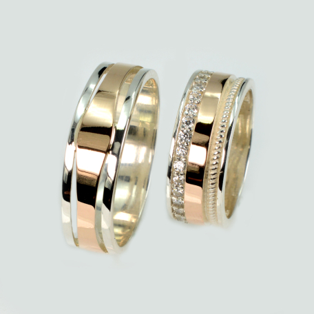 Пара серебряных обручальных колец с золотыми пластинами