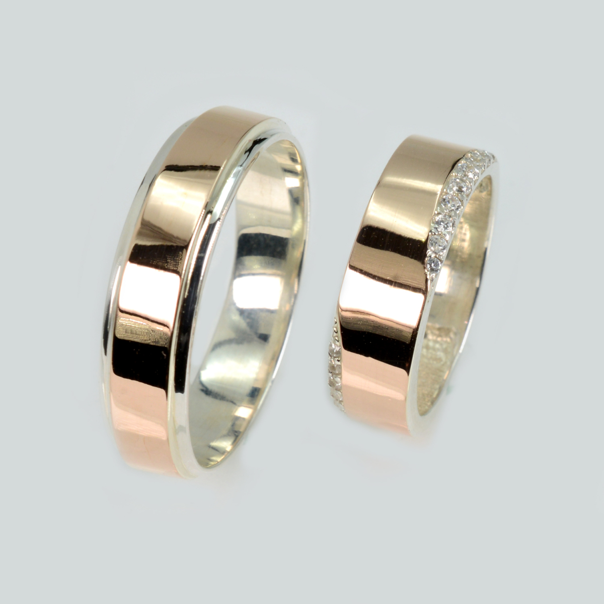 Пара срібних обручок з золотом