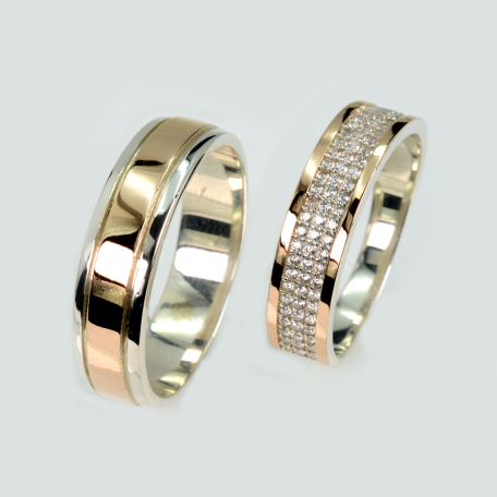 Пара серебряных обручальных колец с золотыми пластинами