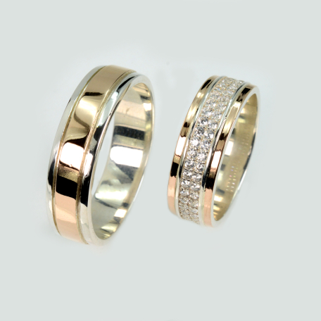 Пара серебряных обручальных колец с золотыми пластинами