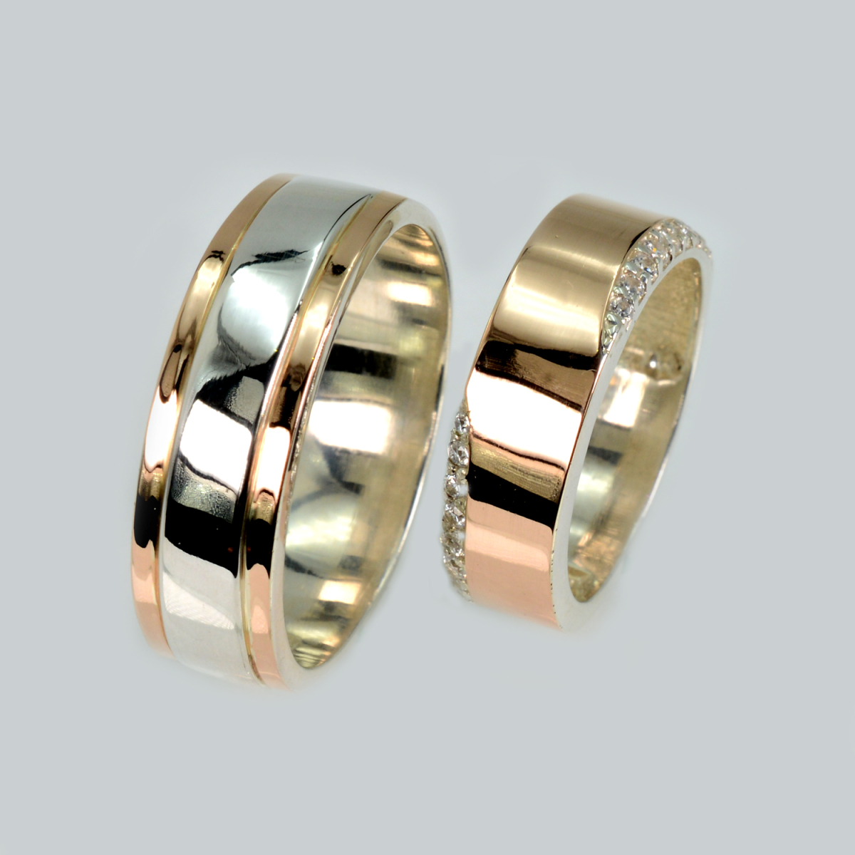 Пара срібних обручок з золотом