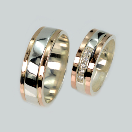 Пара обручальных колец из серебра и золота