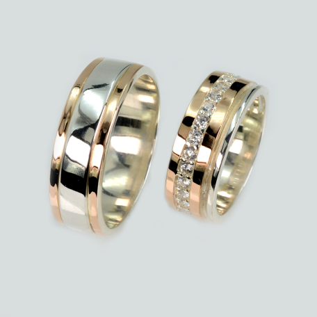 Пара обручальных колец из серебра с золотом