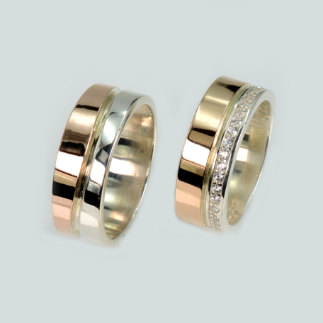 Пара обручальных колец из серебра и золота