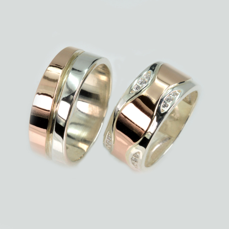 Пара обручальных колец из серебра и золота