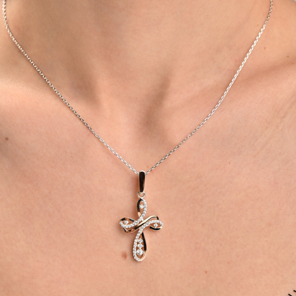 Срібний хрестик з золотими вставками