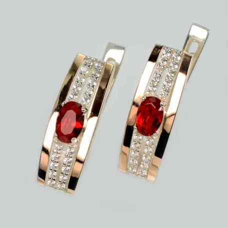 Срібні сережки з золотими пластинами