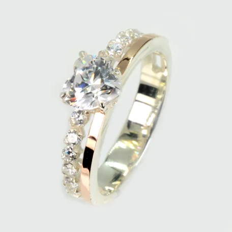 Срібна каблучка з золотими вставками