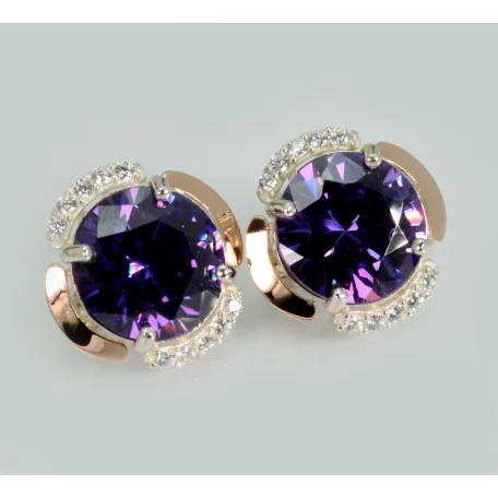 Срібні сережки з золотими пластинами