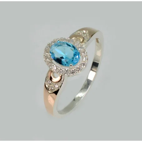 Срібна каблучка з золотими вставками