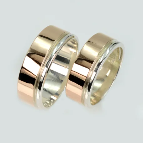 Пара срібних обручок з пластинами золота