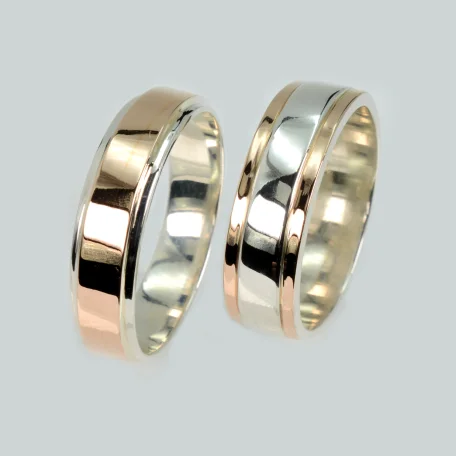 Пара срібних обручок з золотом