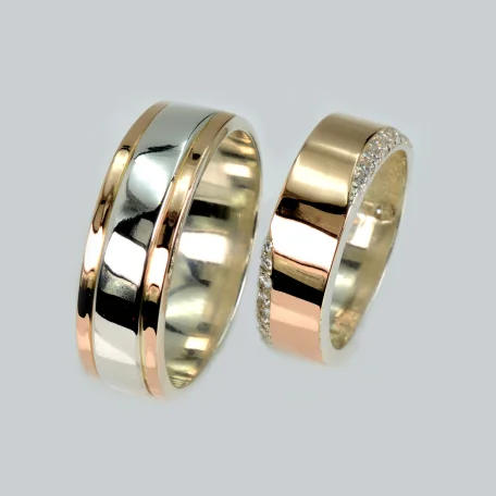 Пара обручок зі срібла та золота