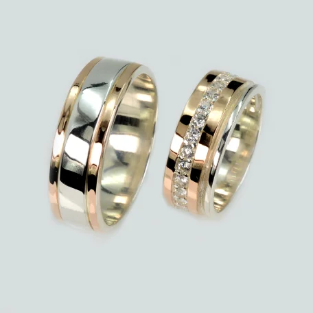 Пара срібних обручок з золотом