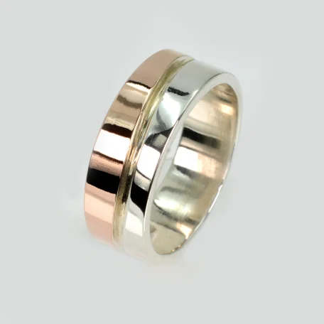 Срібна обручка з золотими пластинами