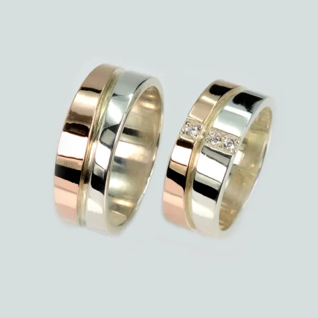 Пара срібних обручок з золотом